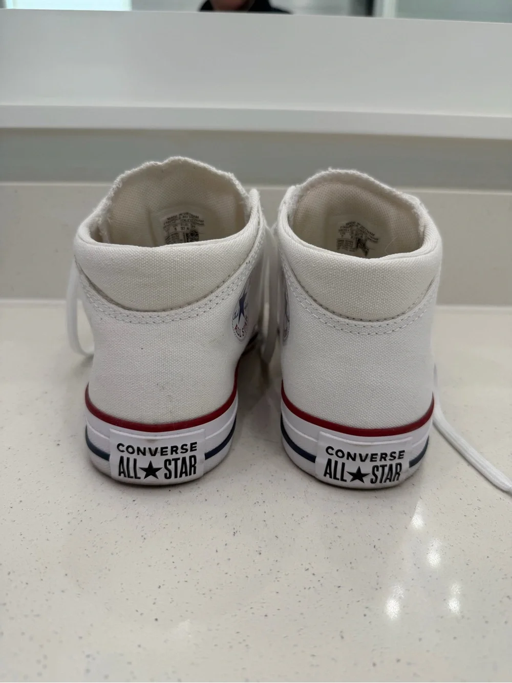 Converse White Low Top Sneakers with Red Accent